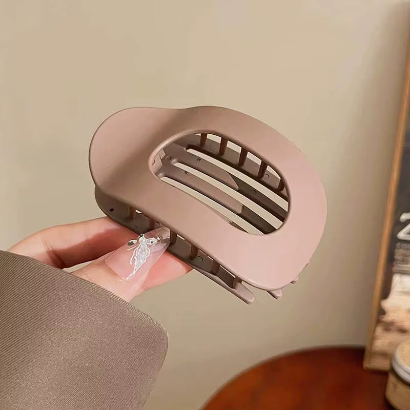 Clipia - Raccogli i capelli. Elimina il fastidio.